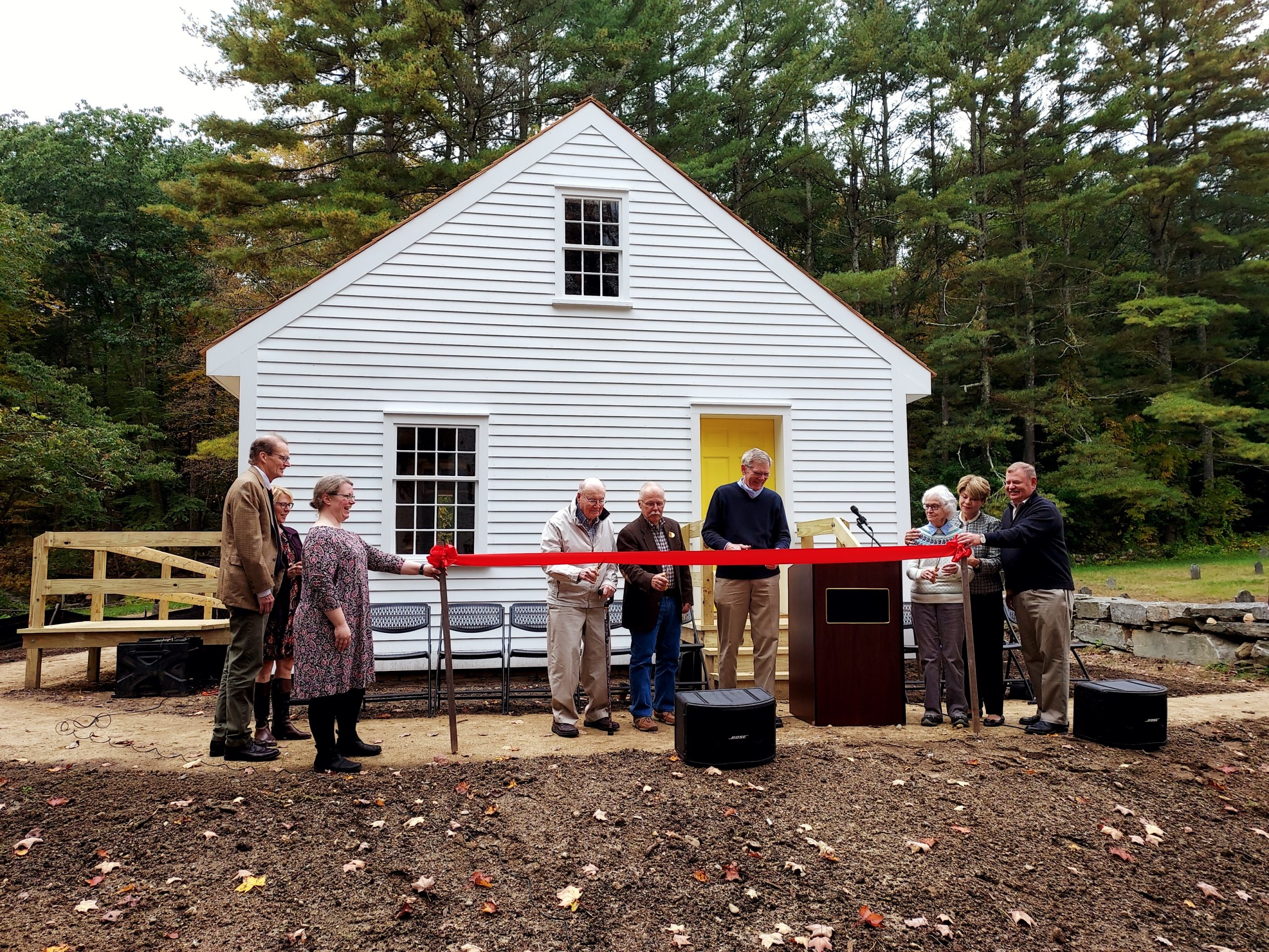 Cutting the ribbon at the opening ceremony of the Cabinetmaking Shop