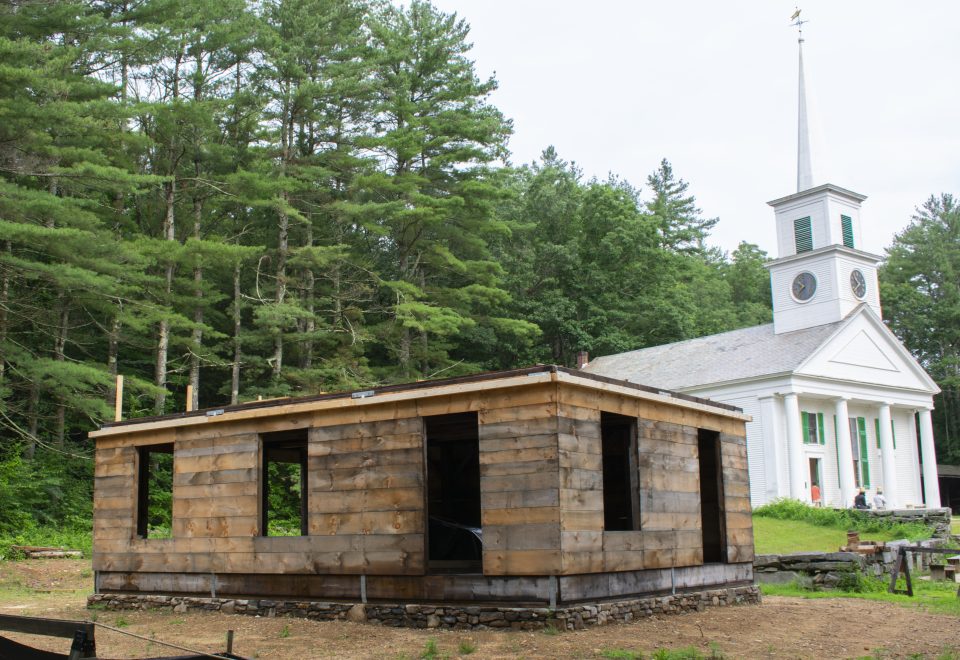 Showing the Cabinetmaking Shop building in progress. Walls are up!