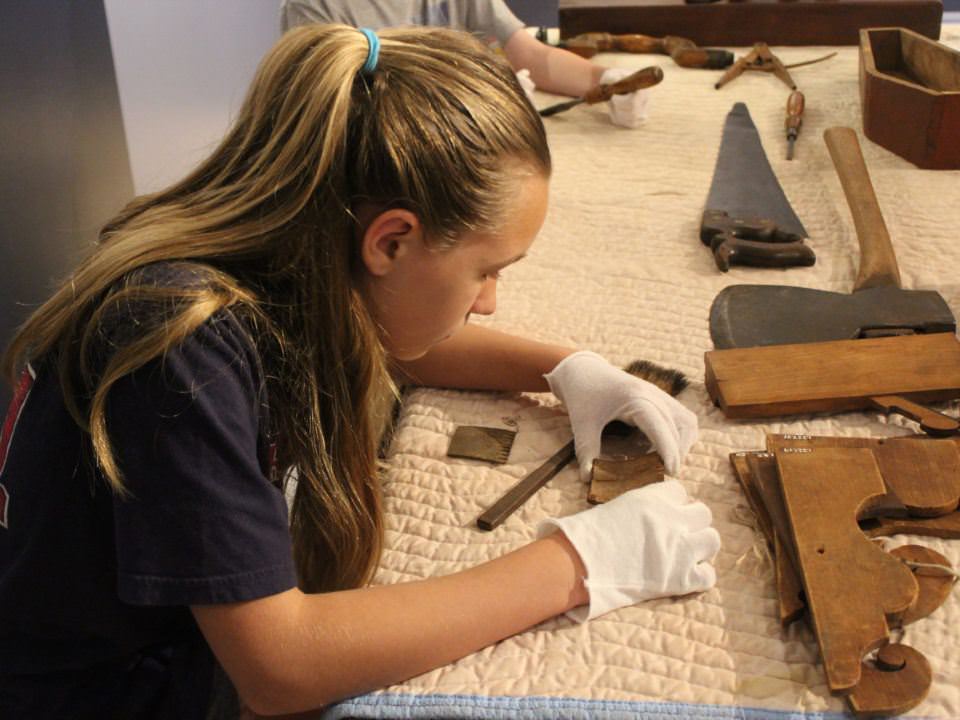 A Discovery Adventures Camper gets to see items from the OSV Collection