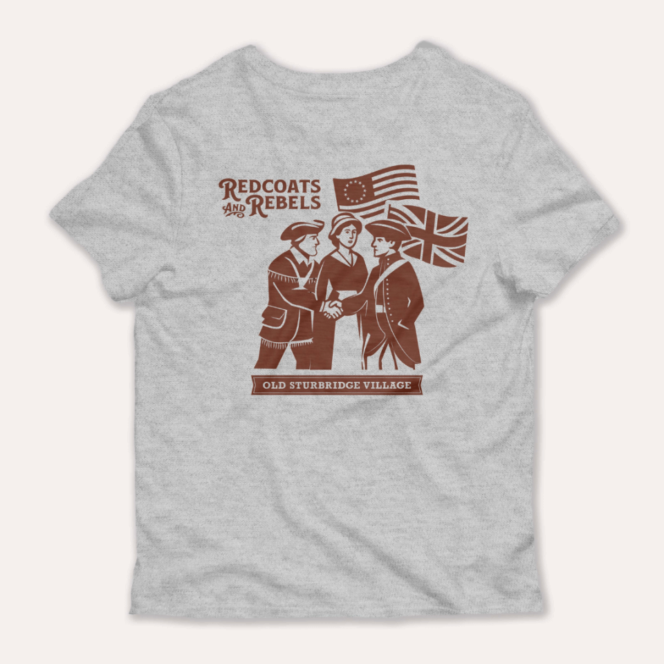 Redcoats & rebels t-shirt showing two soldiers and a woman in colonial garb